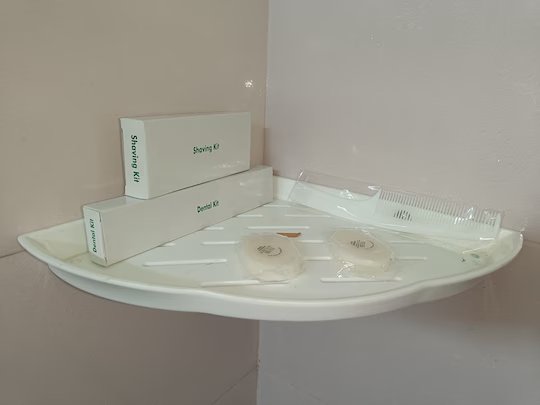 Complimentary toiletries on the bathroom shelf
